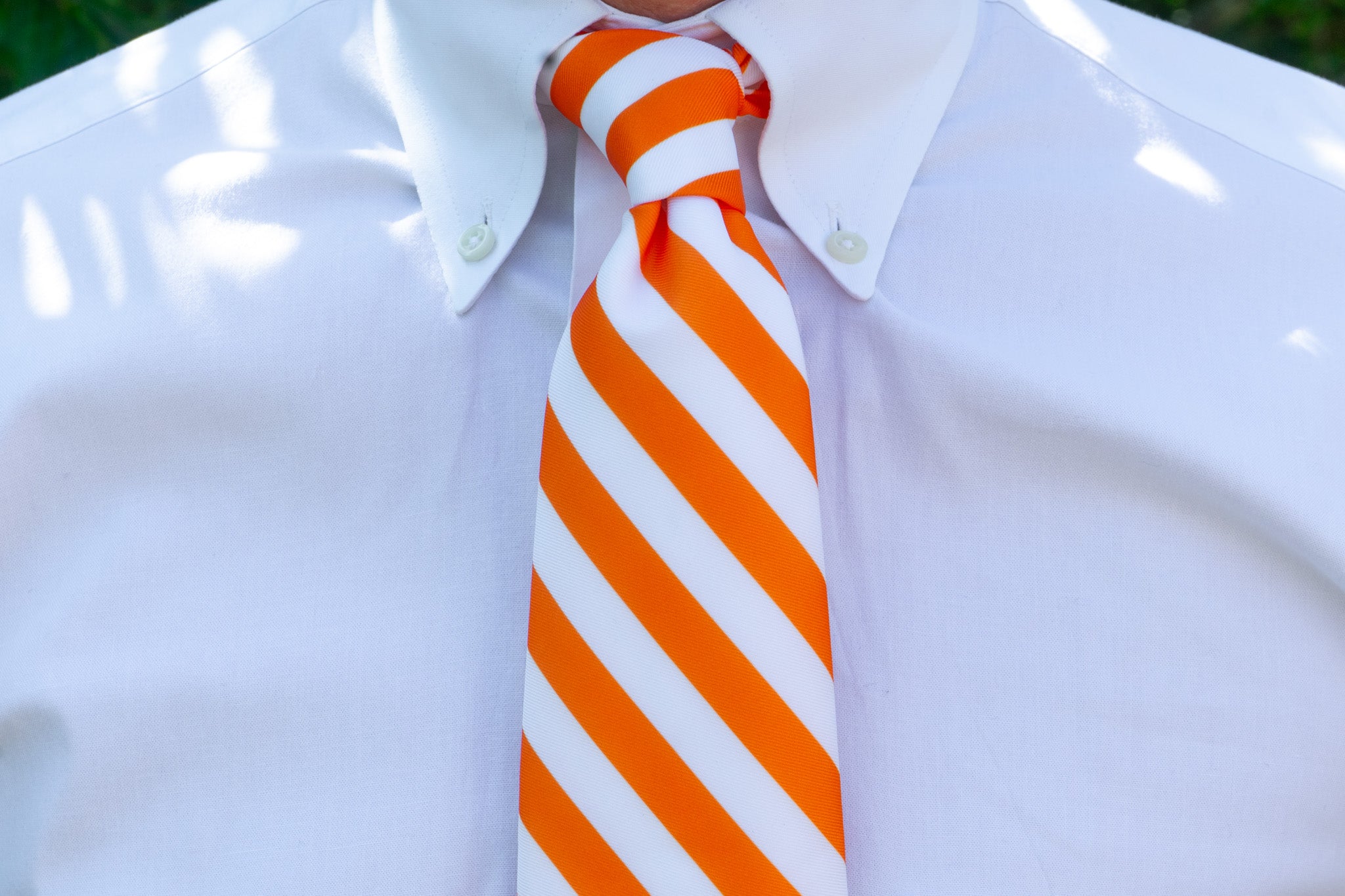 white shirt orange tie